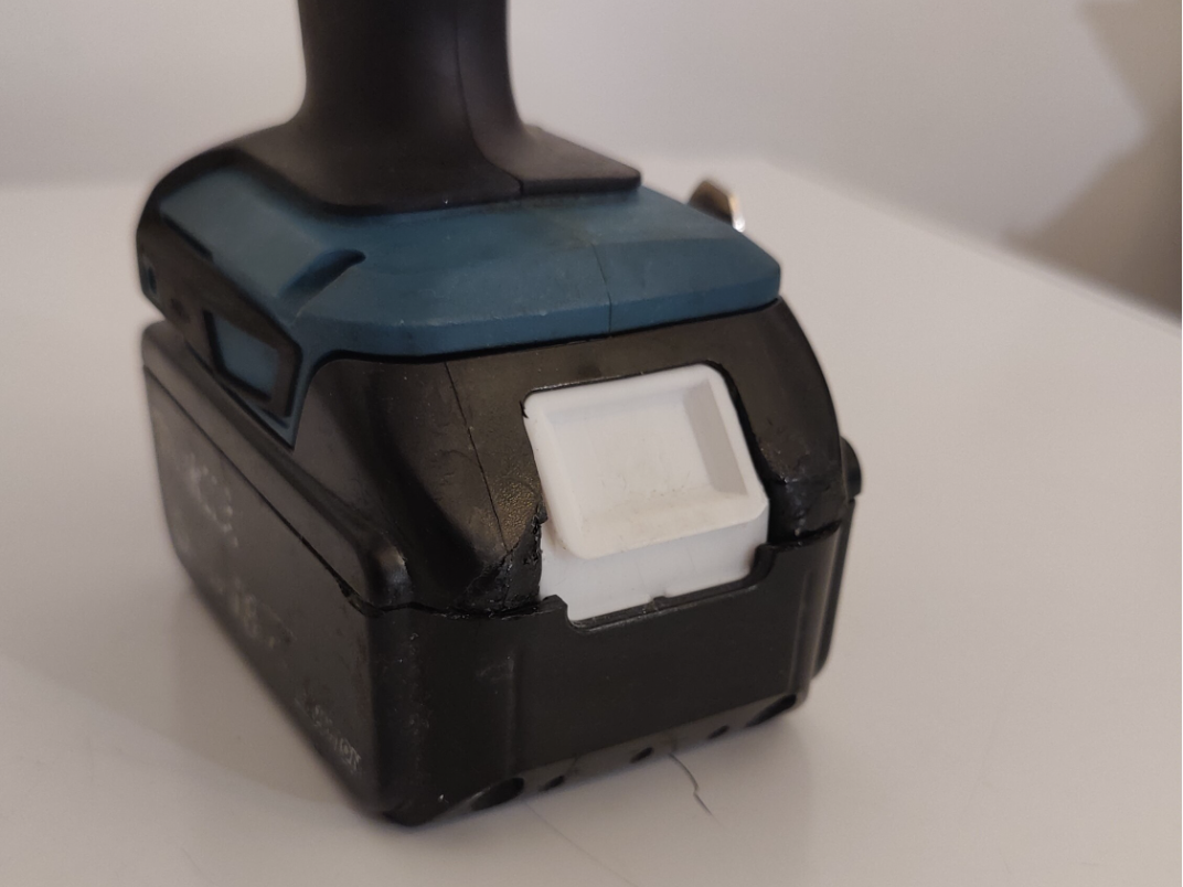Makita battery button
