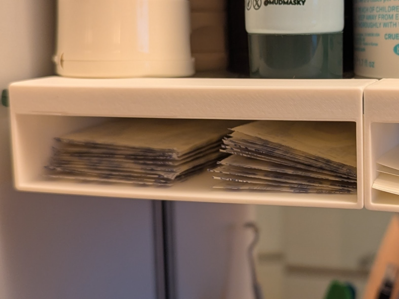 Hanging shelf extension for medicine cabinet