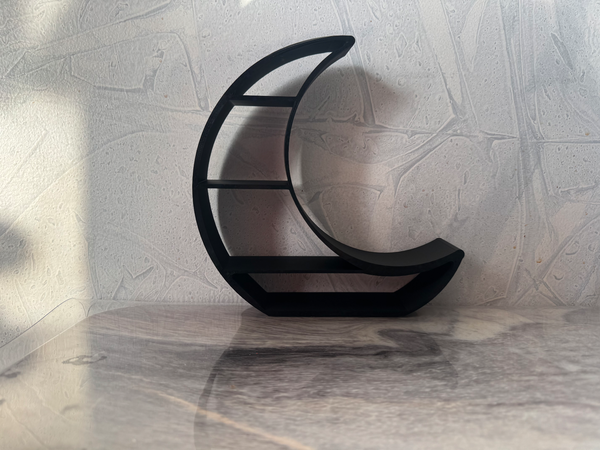 Crescent moon display shelf