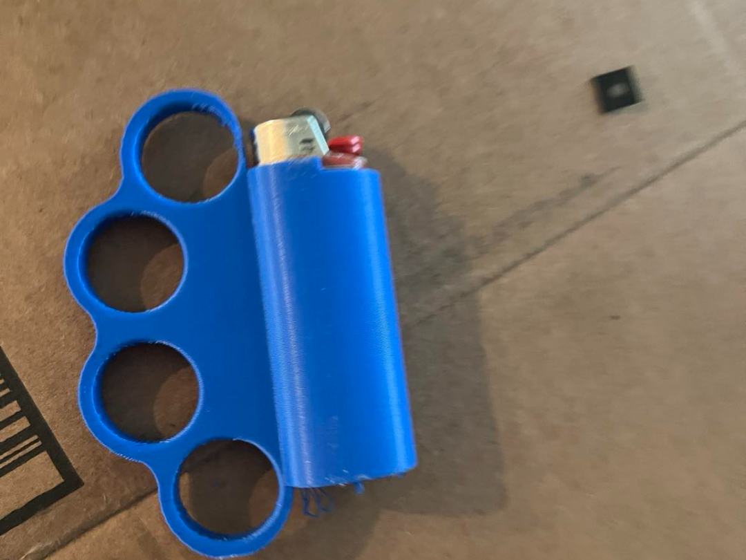 knuckle duster lighter sleeve