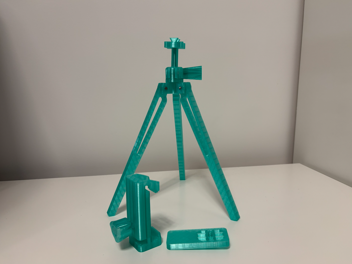 Tripod with phone and camera attachments