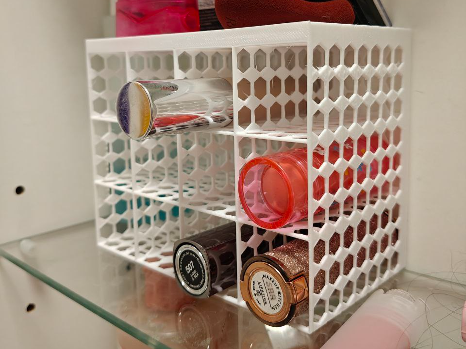 Tube cosmetics holder