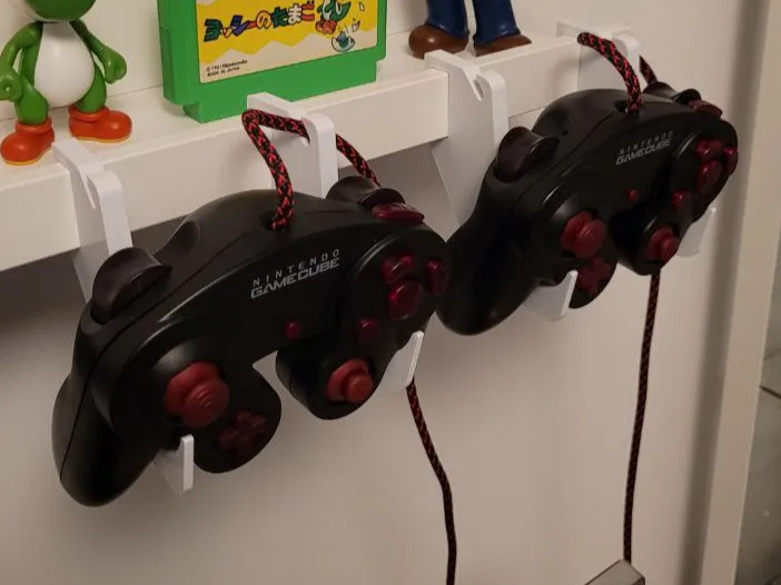 Gamecube controller supports IKEA MOSSLANDA shelf