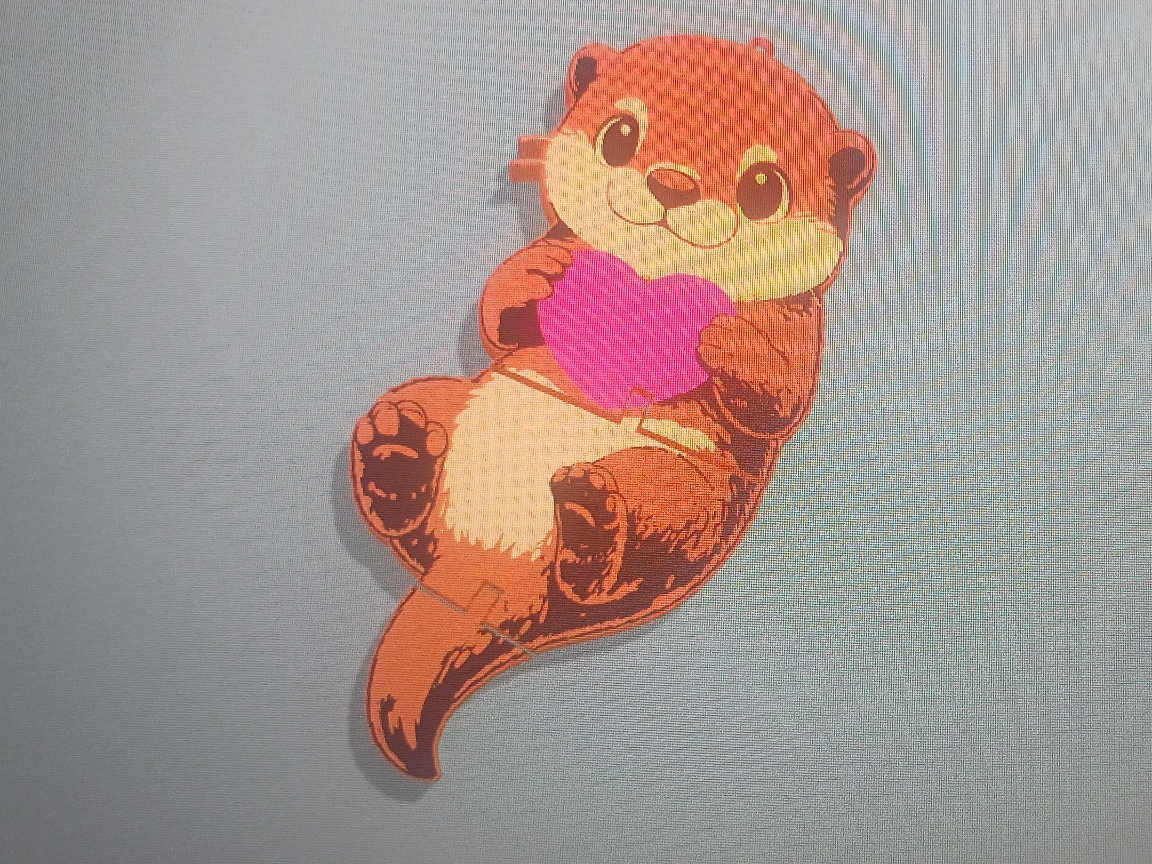 Otter with hart keychain