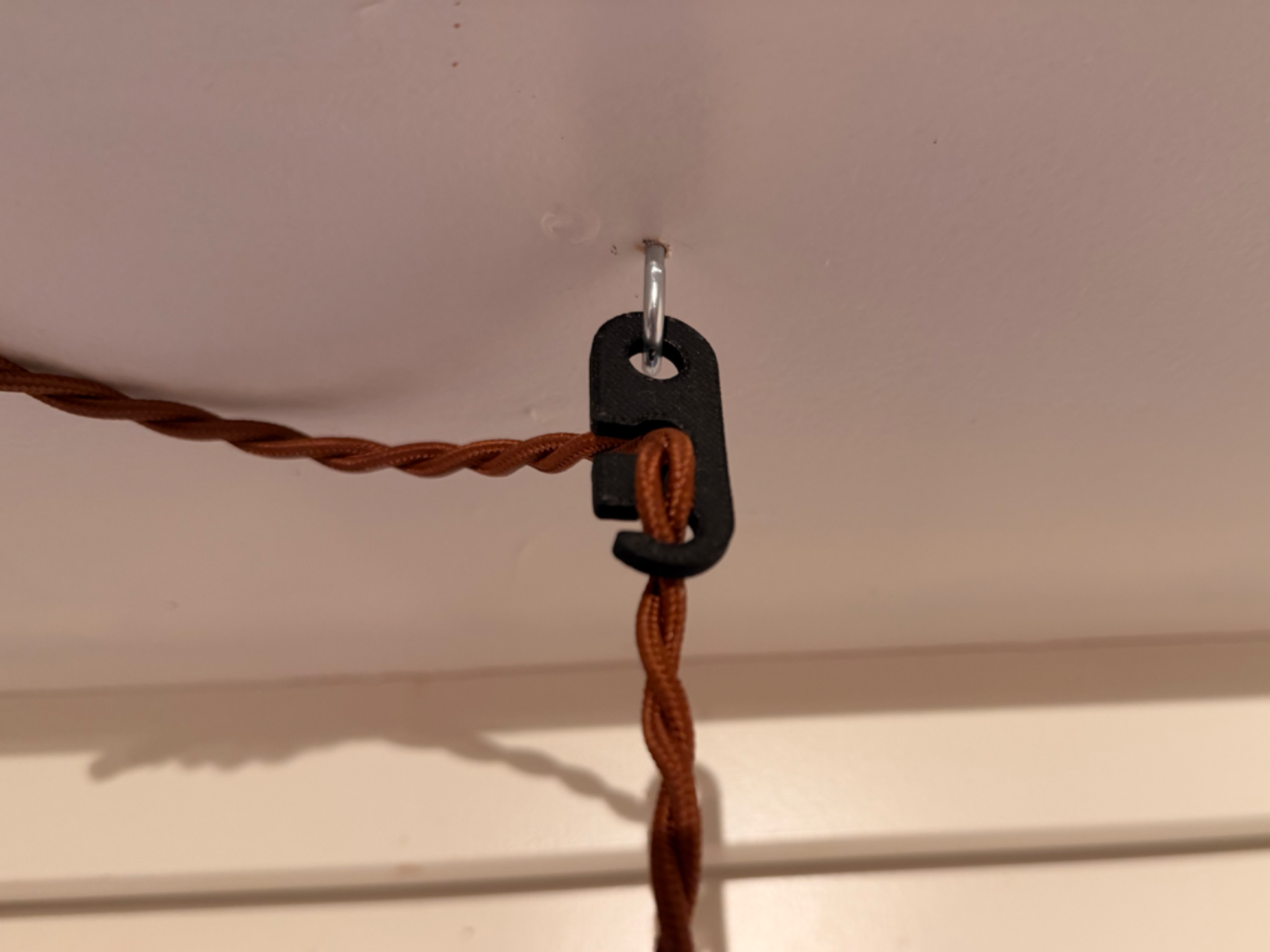Lamp cord holder & shortener