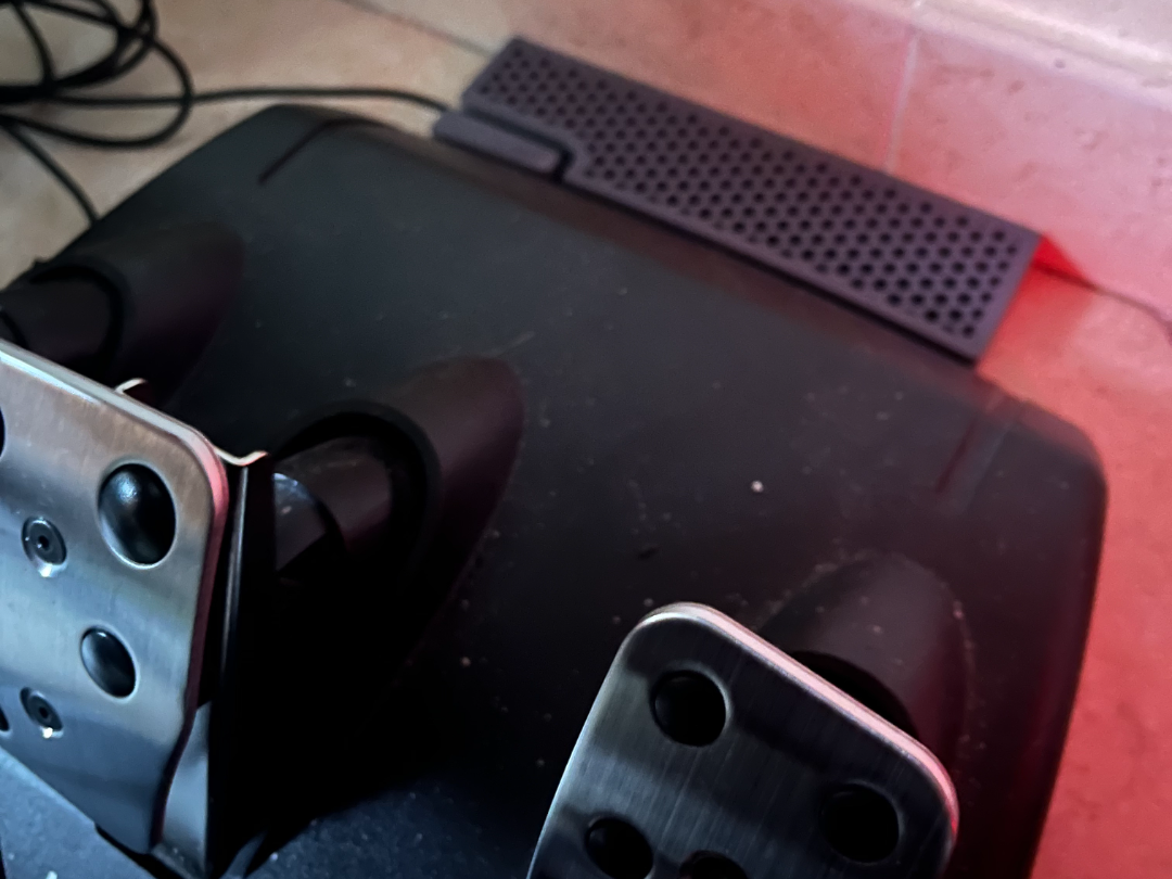 Wall spacer for logitech pedals
