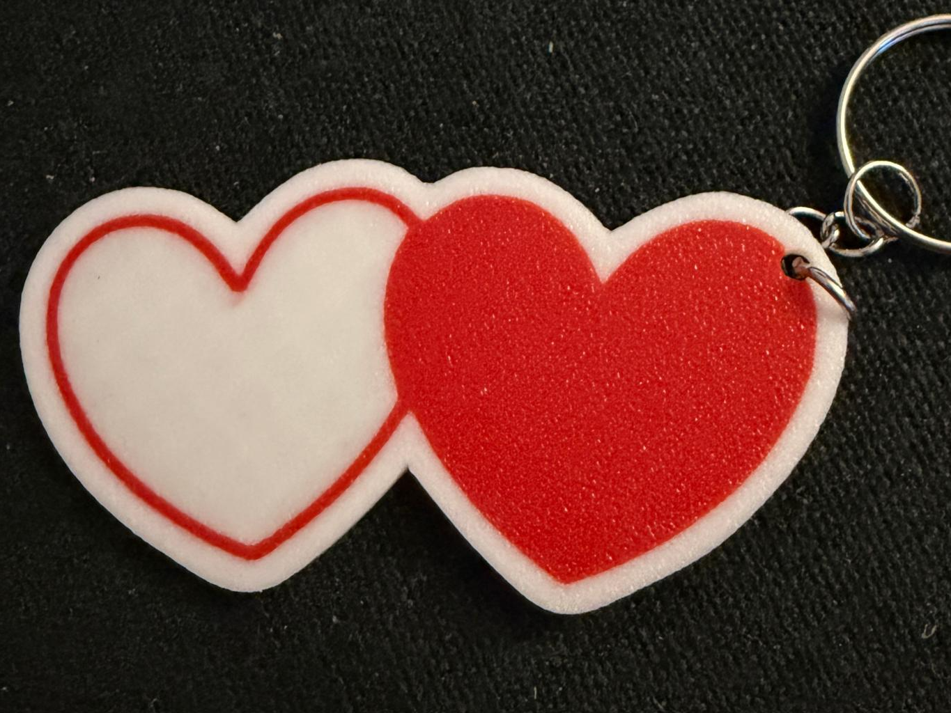 Porte clé double coeur