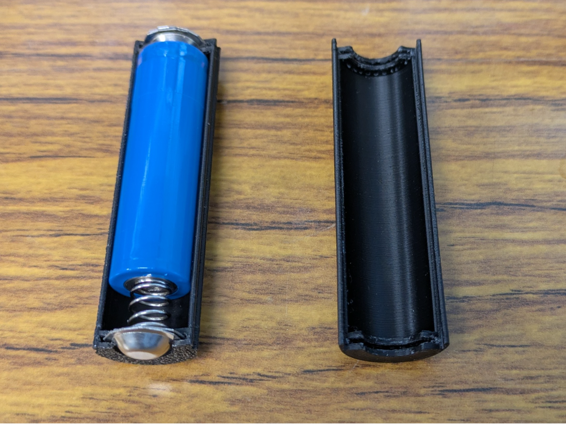 Battery sleeve adapter converting 14500 to 18650