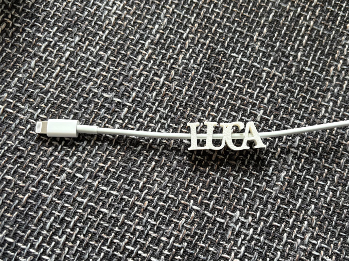 Charching cable name tag "Luca"