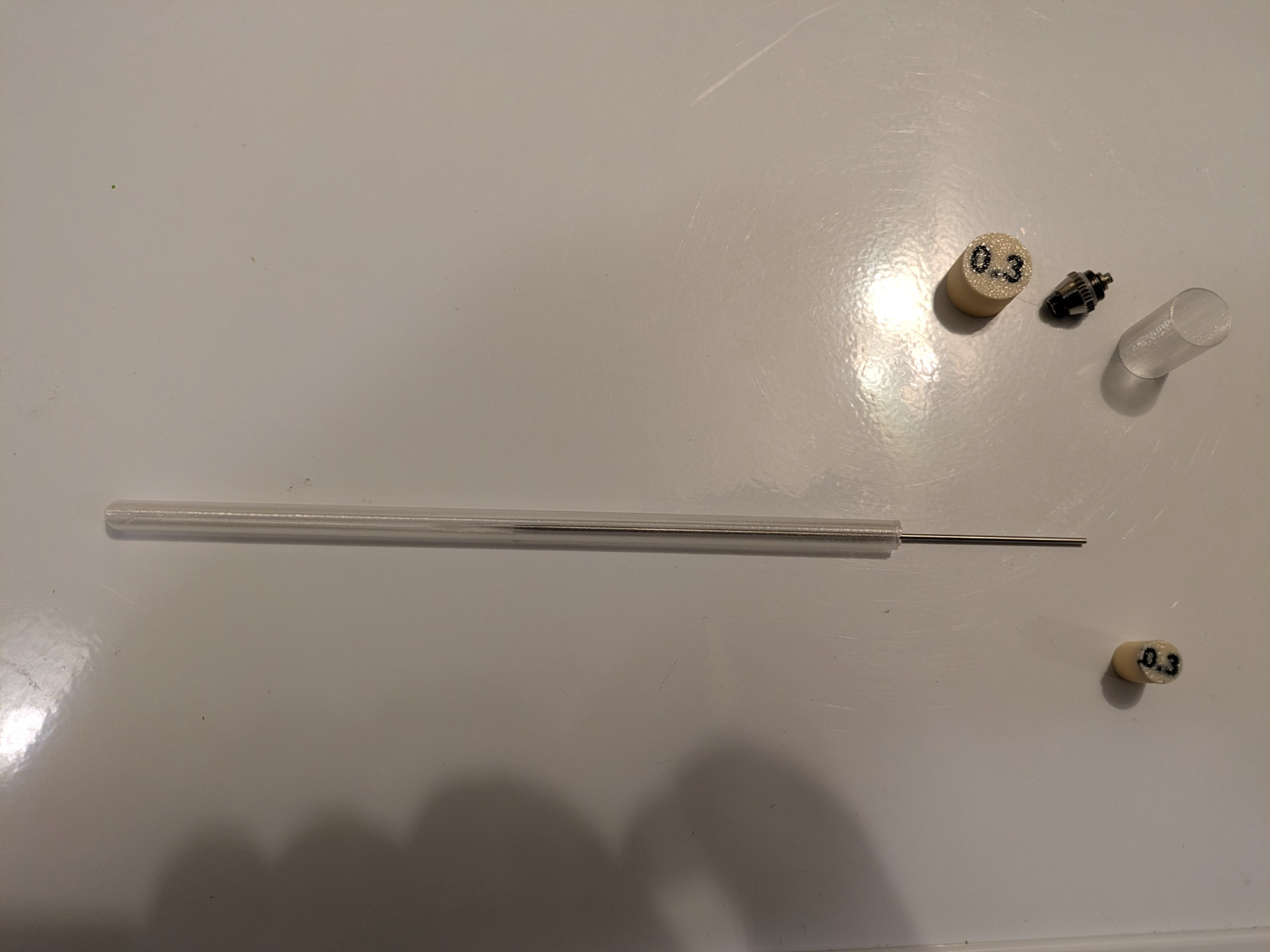 Airbrush needle + nozzle tubes with size label