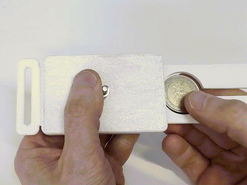 Coin Through Bolt Magic Trick