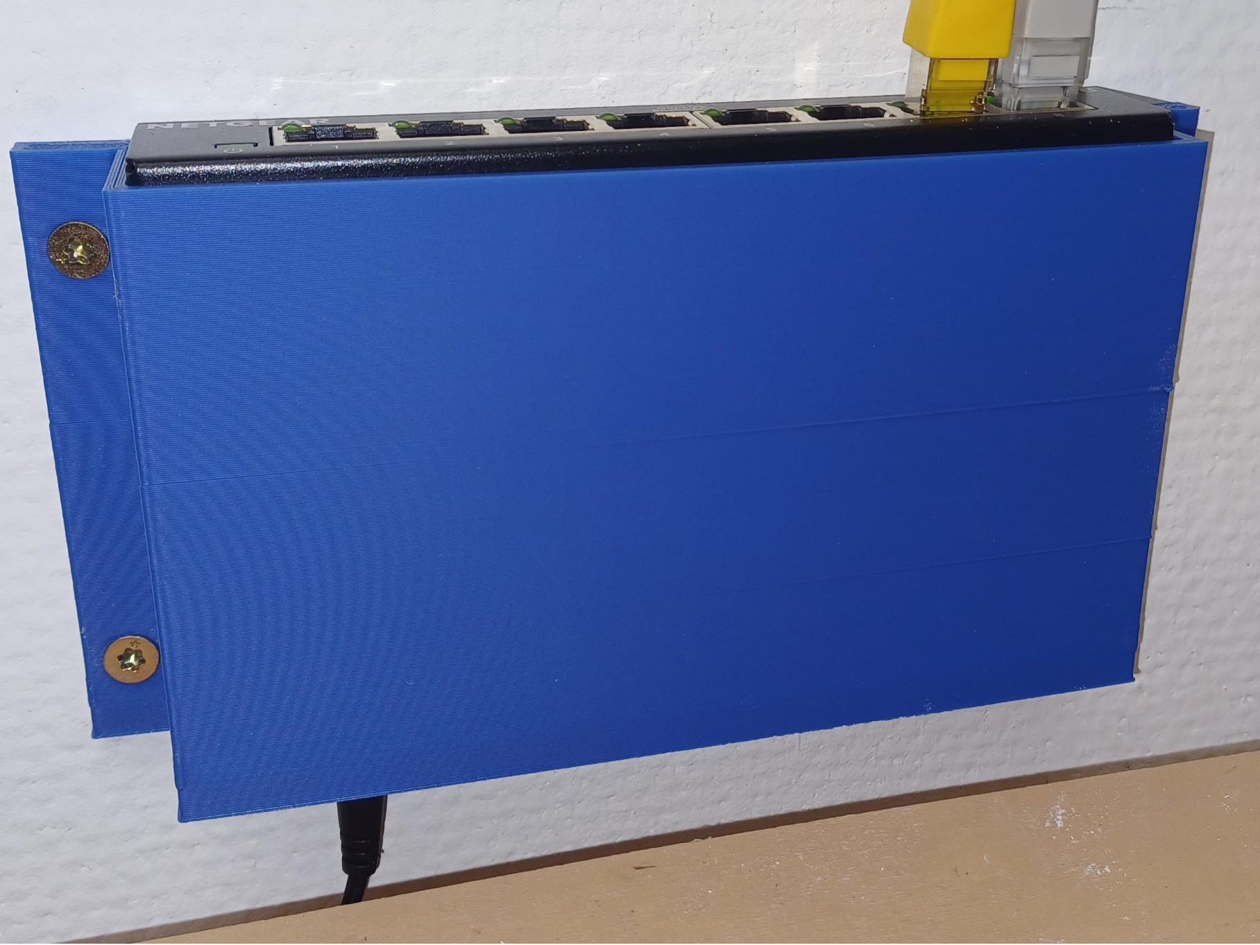 Wall mount for a NETGEAR GS308 switches