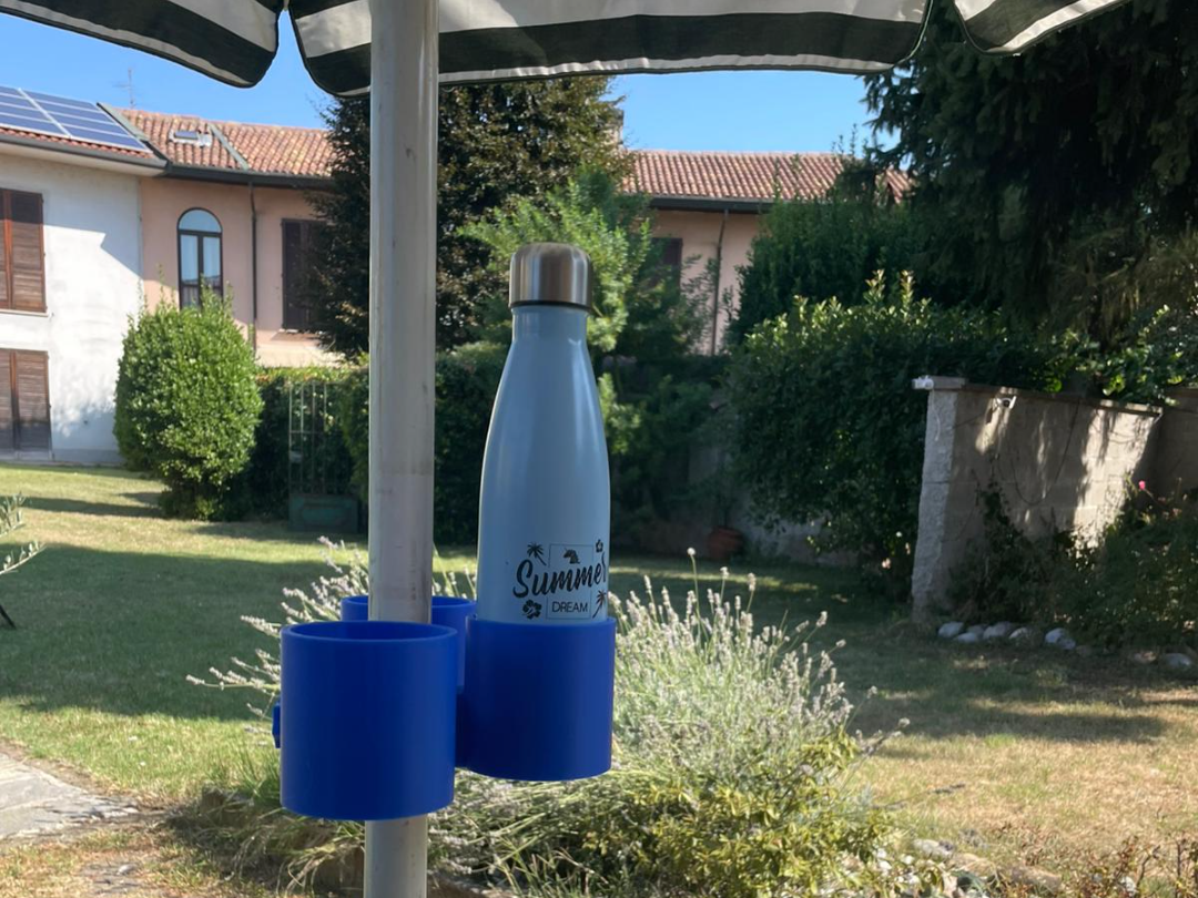 Cup and bottle holder for beach umbrella