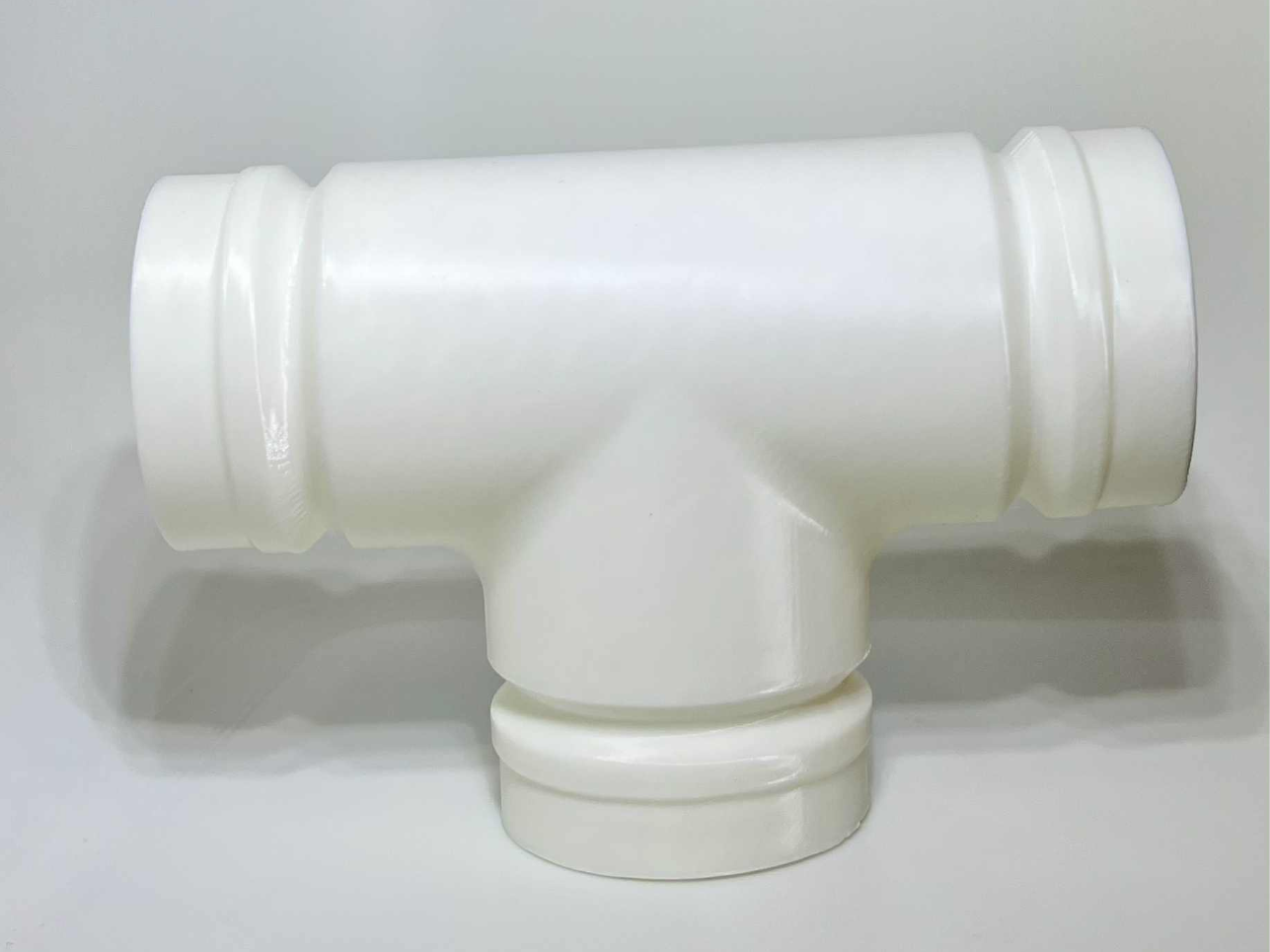 Grooved T-section pipe
