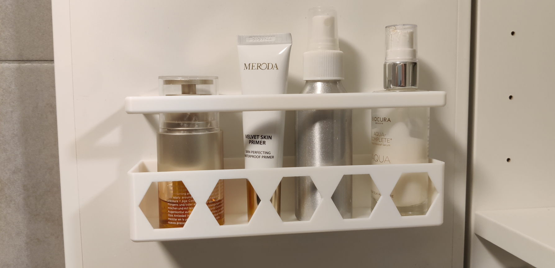 Cupboard door shelf with rail