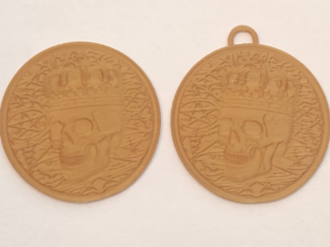 skull relief coin