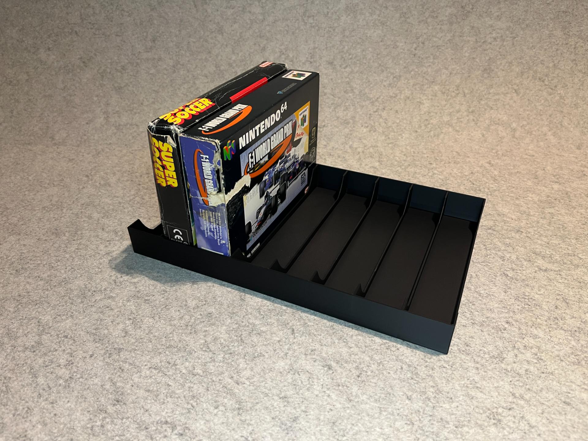Display stand holder for N64 SNES Nintendo games