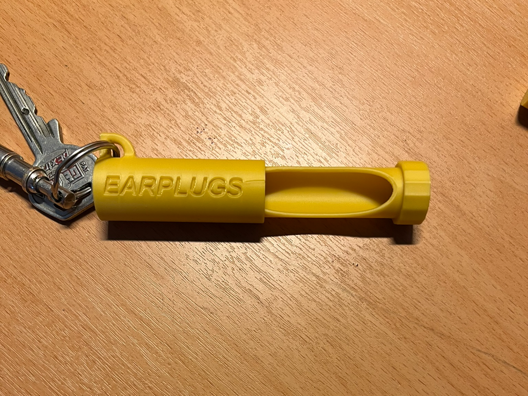 Earplug case for keychain (english text)