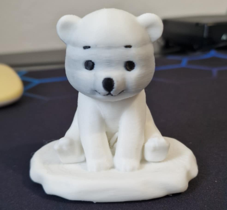Baby polar bear on ice - AI
