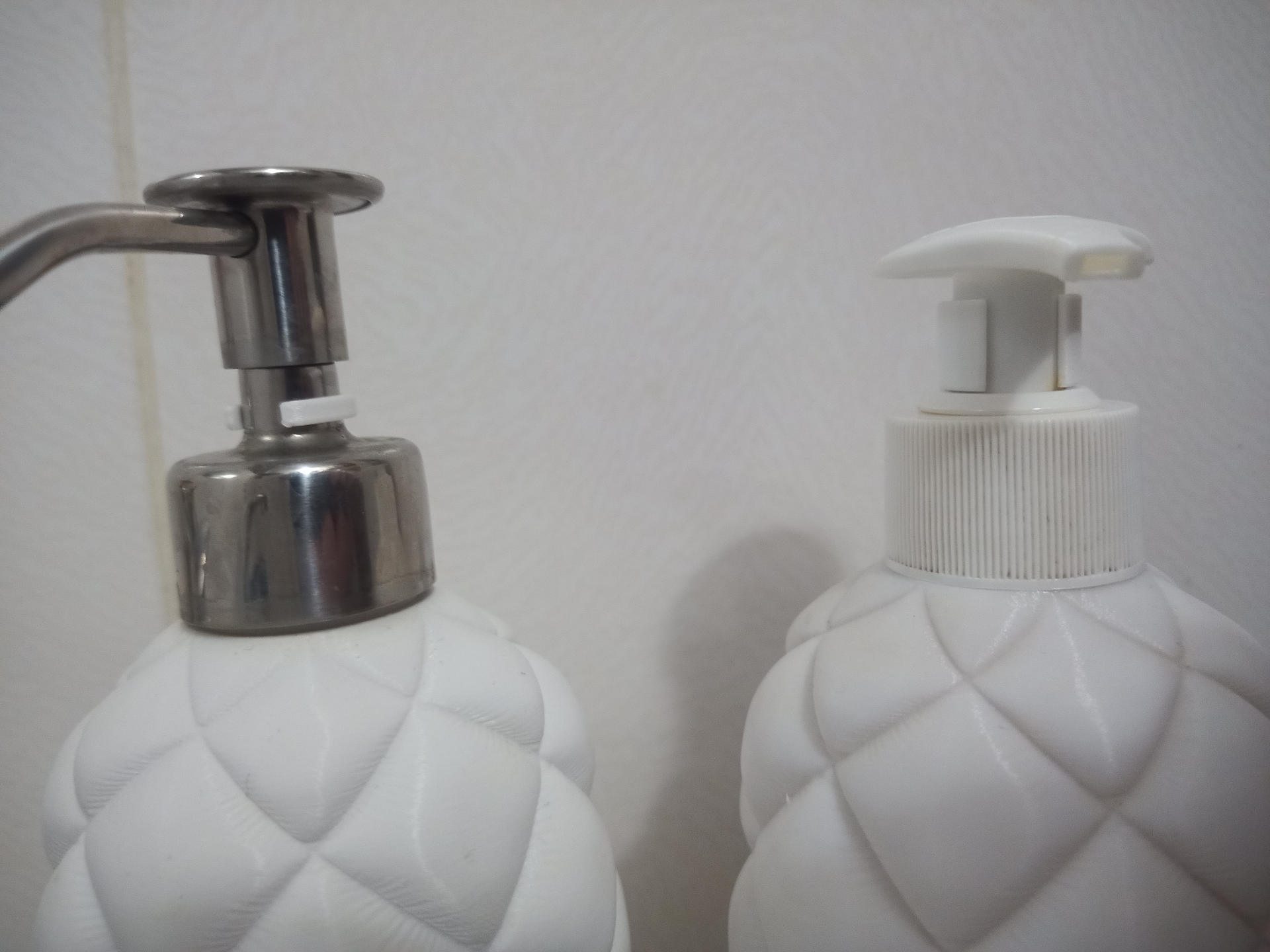 Soap dispenser pump limiter stop ring economizer