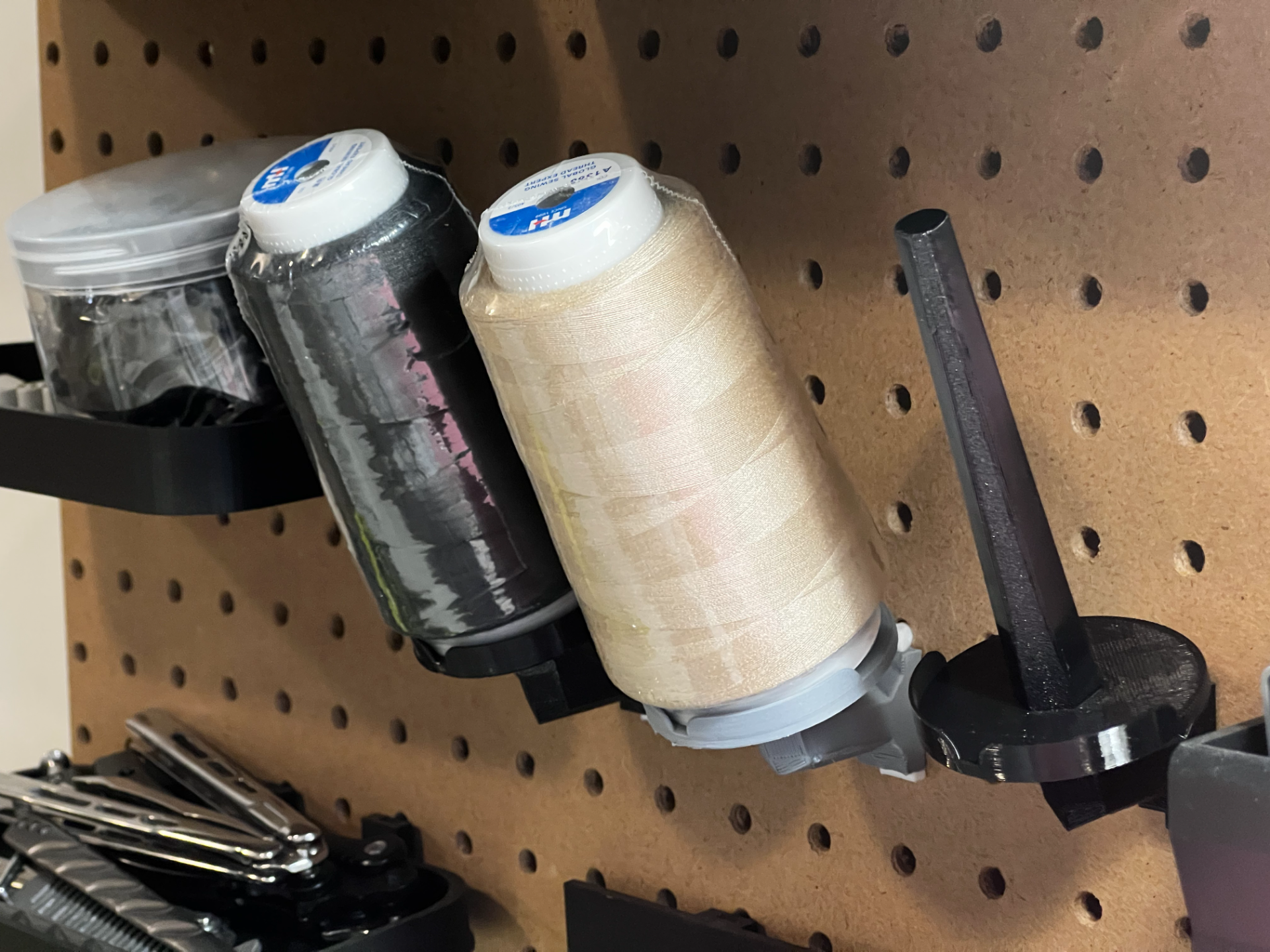 Sewing thread spools holder on 1inch pegboard