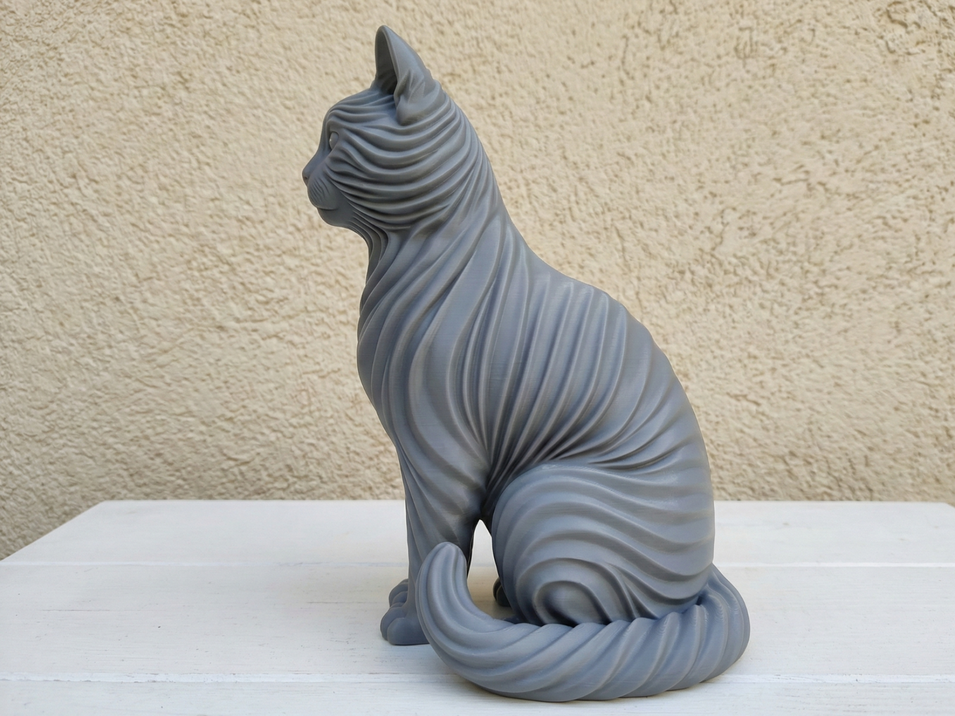 Elegant Flowing Waves Cat Sculpture