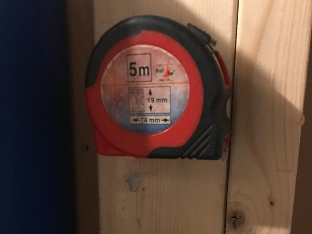 Tape mesure wall mount
