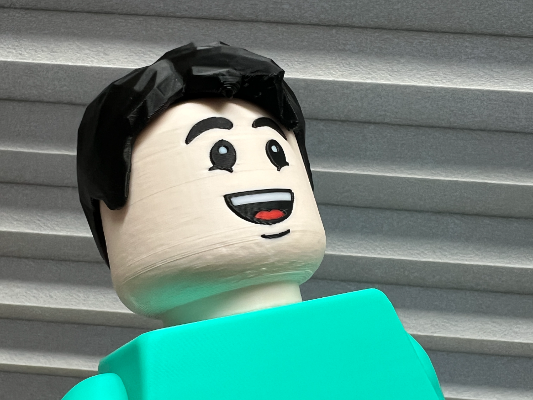 Big Brick * Male Face with Smile