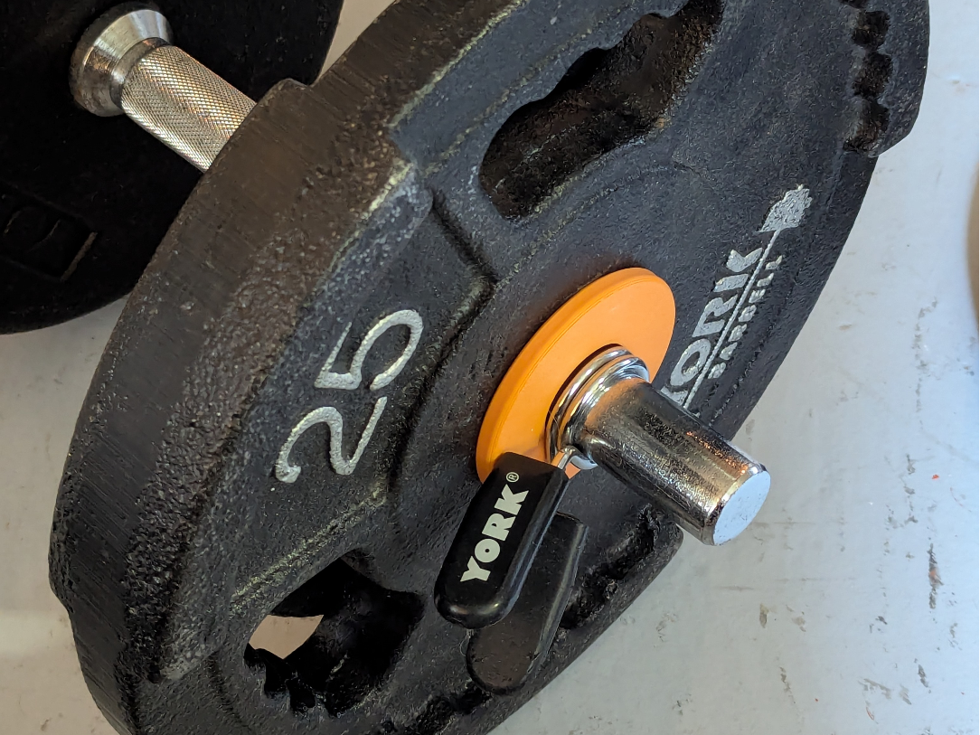Weightlifting plate diameter adapter 2in to 1in