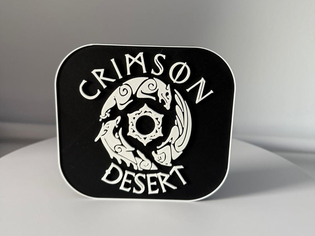 Crimson Desert logo sign desk