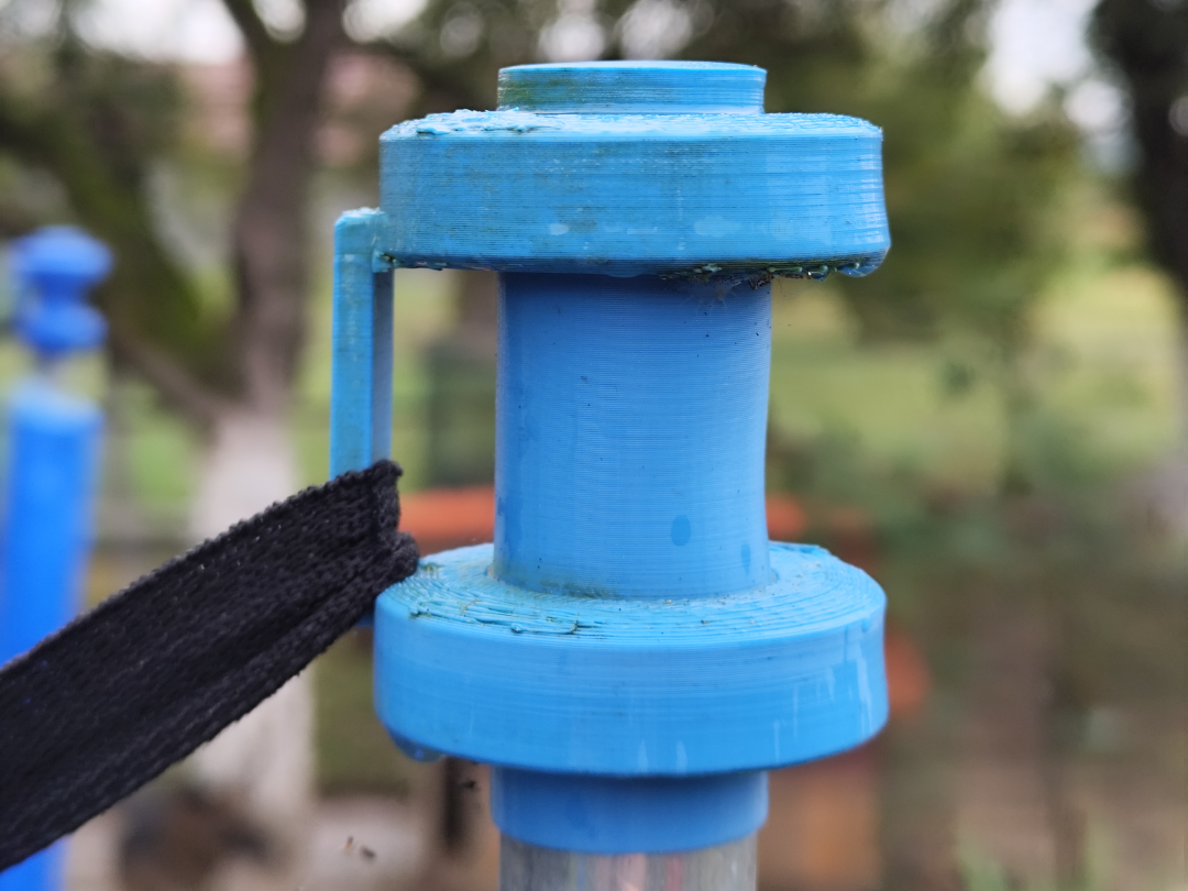 Trampoline net holder