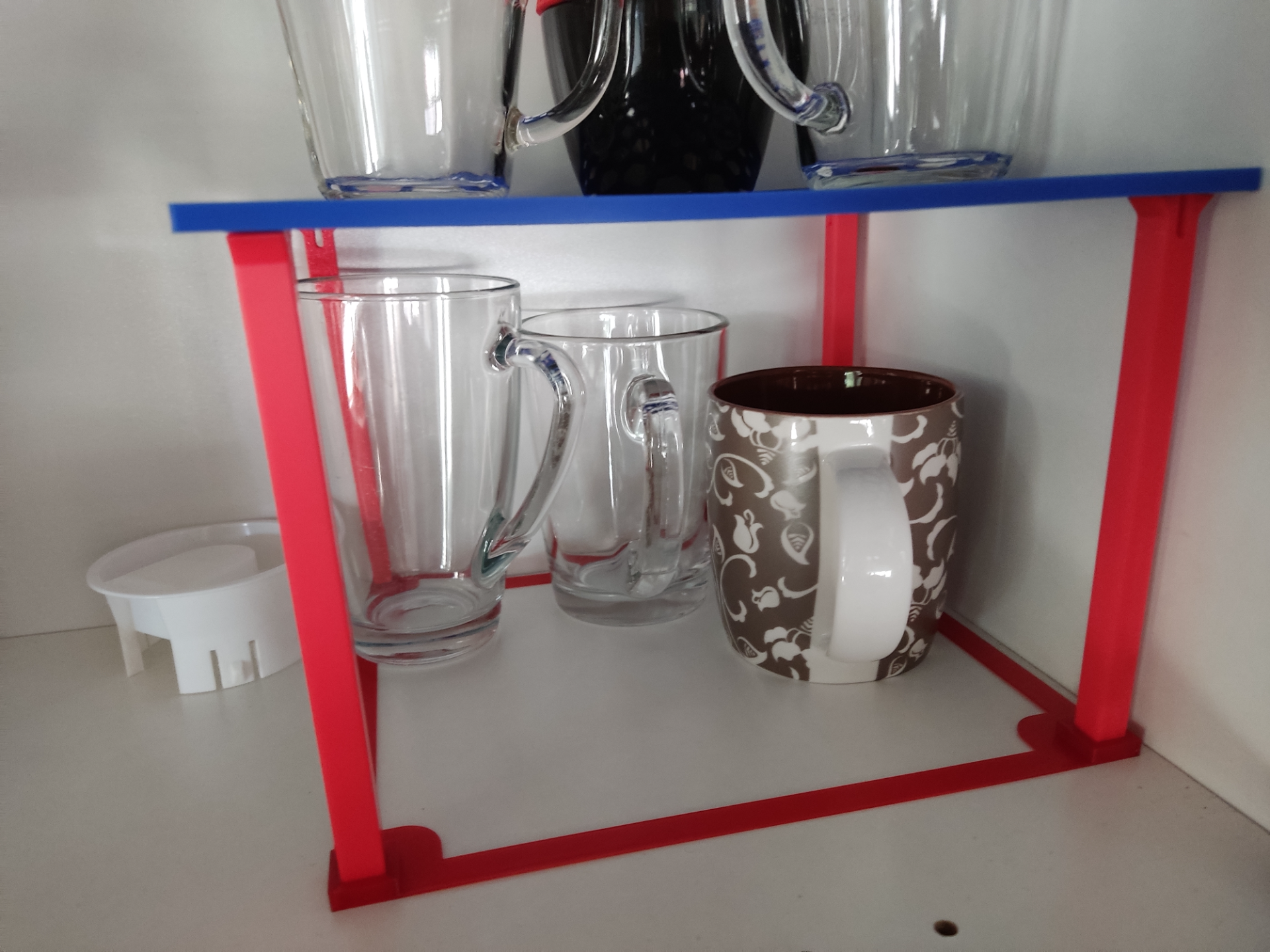 Cup/cabinet shelf reinforcement