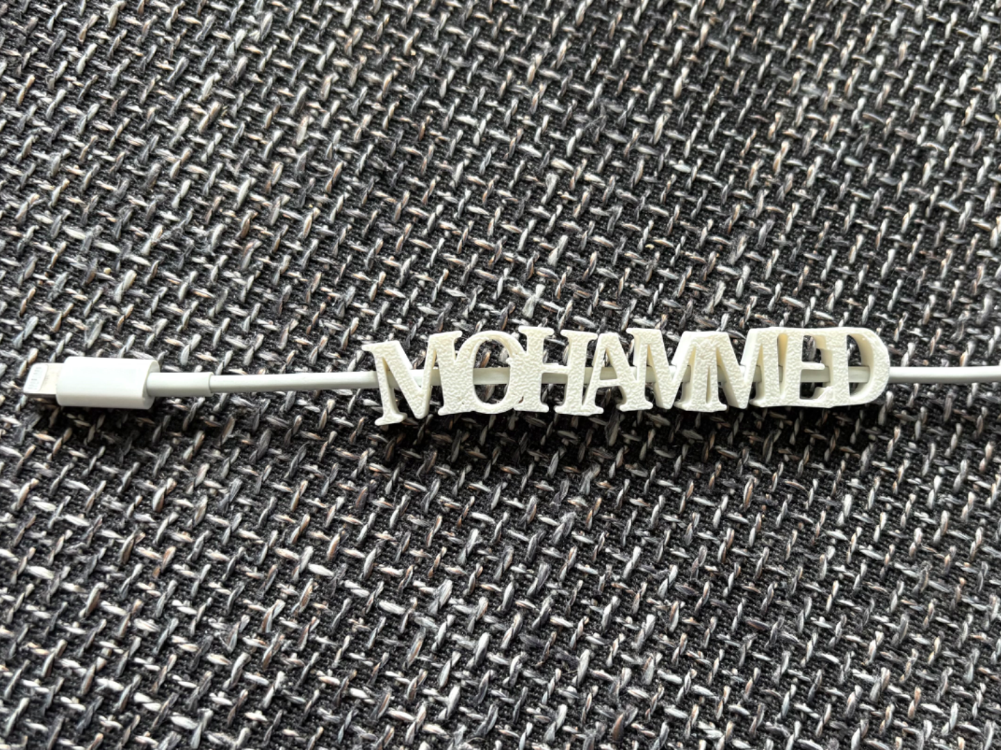 Charching cable name tag "Mohammed"
