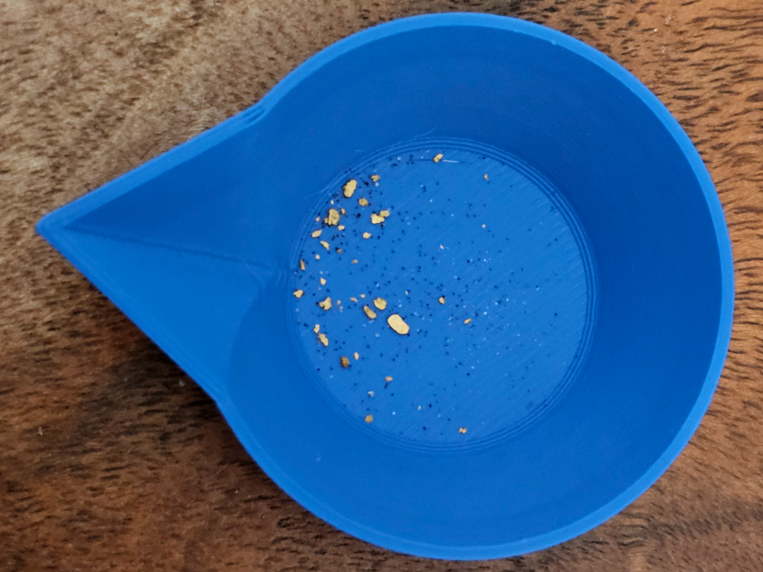 Gold_Jug_for_pouring_Gold_on_a_Scale