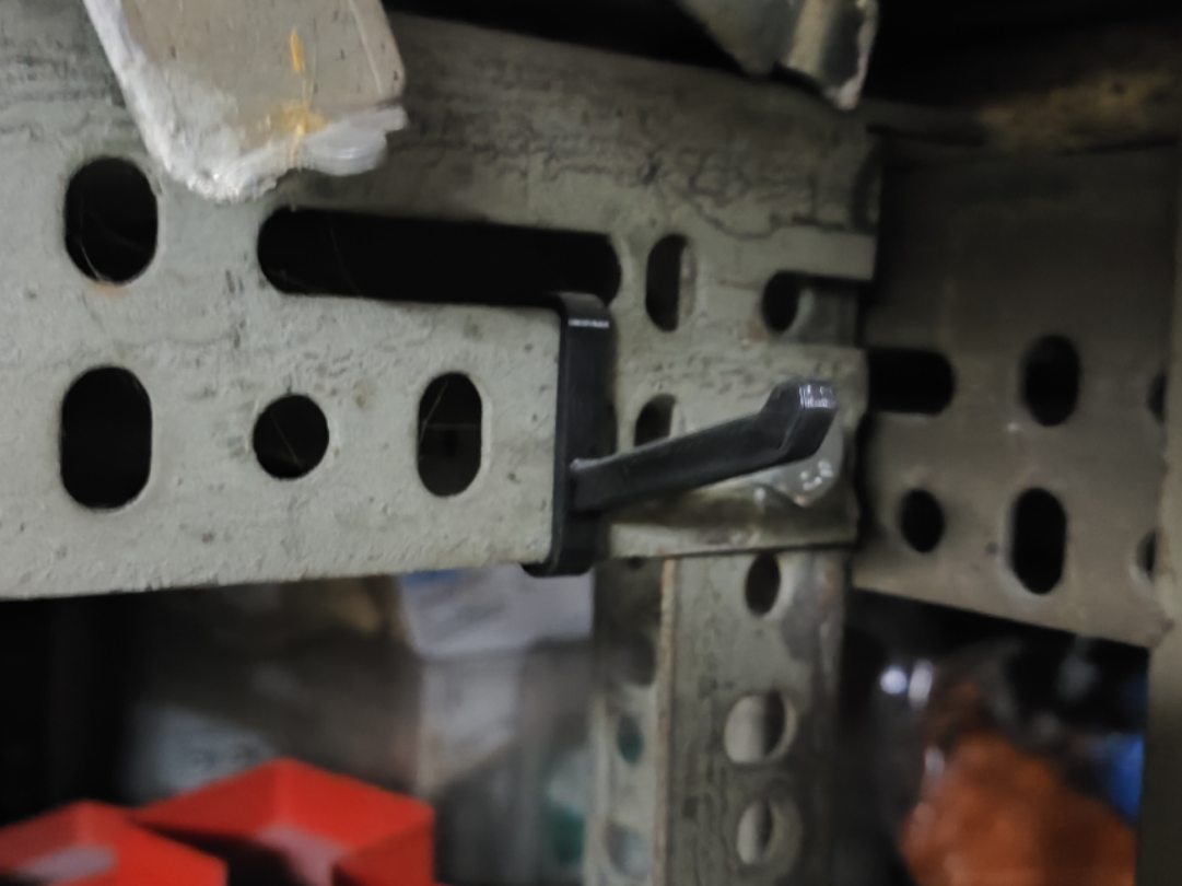 Hook for metal profile