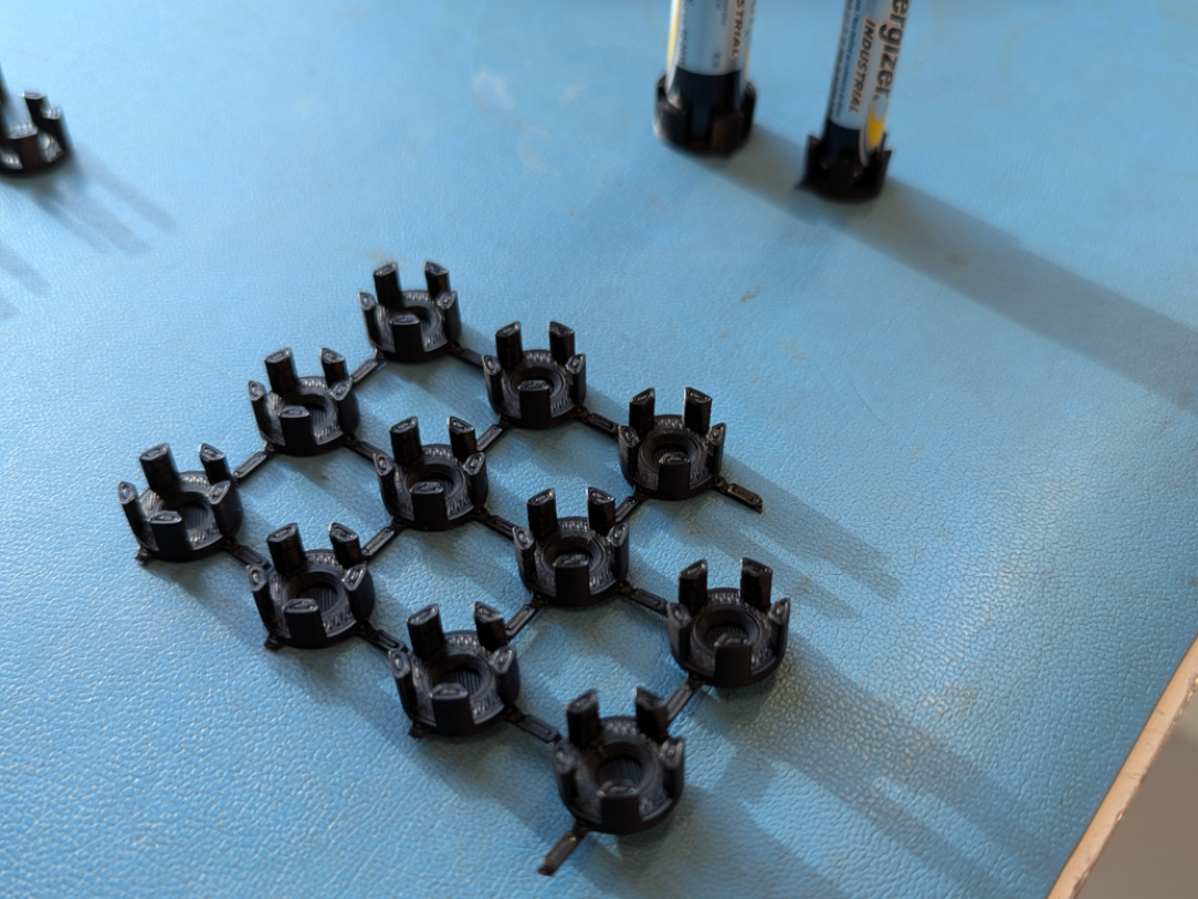 Used AA battery pol cap