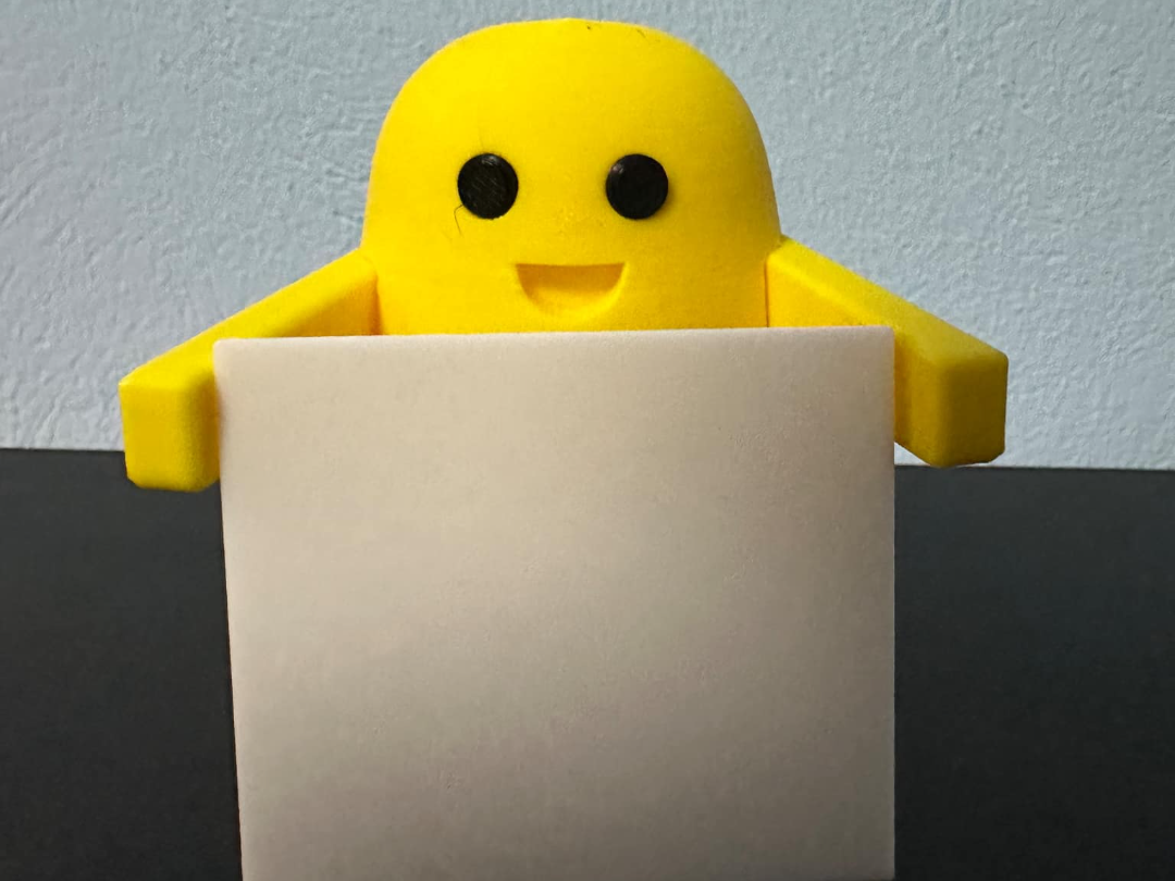 Cute little potato holding a sign
