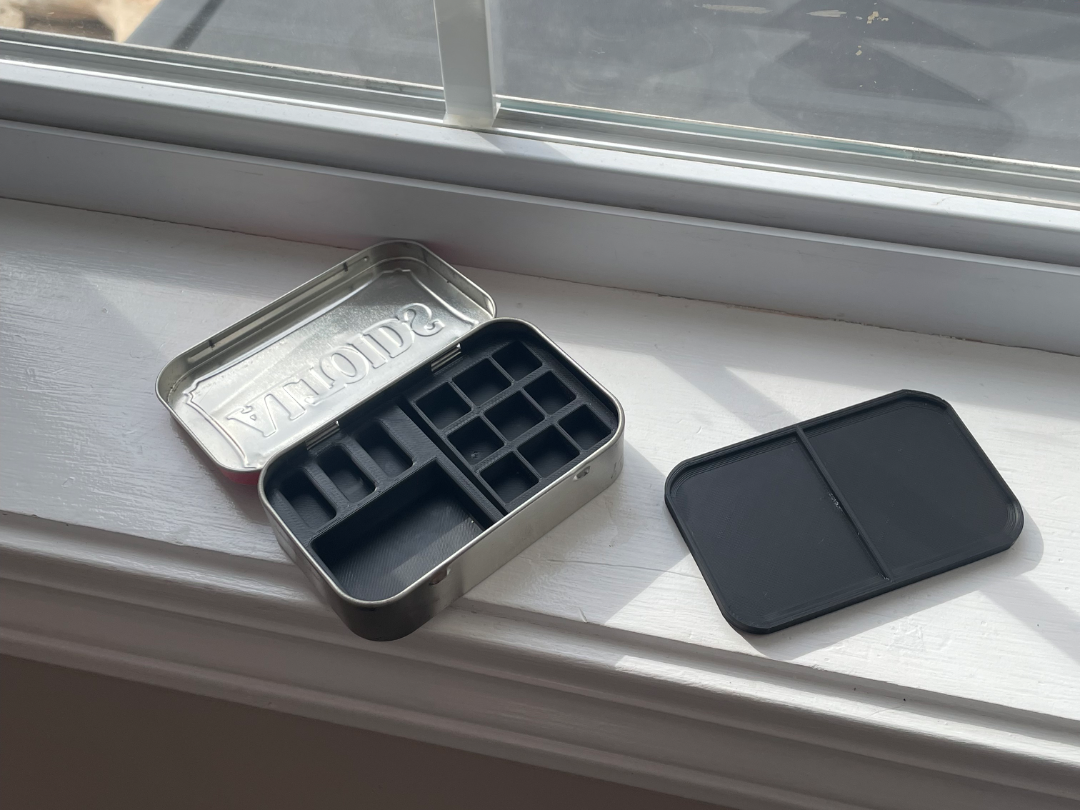 Mintipainting. A painting set in an altoid tin.