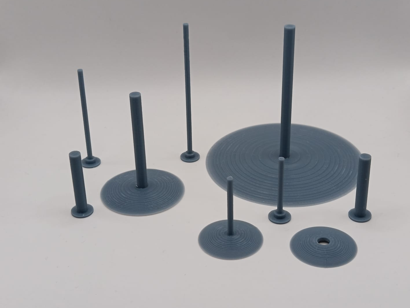 Modular bases for flying miniatures