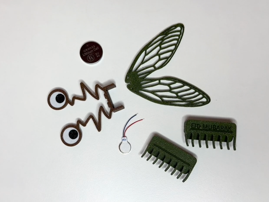 Cicada wings & googly eyes add-ons for scooterbot