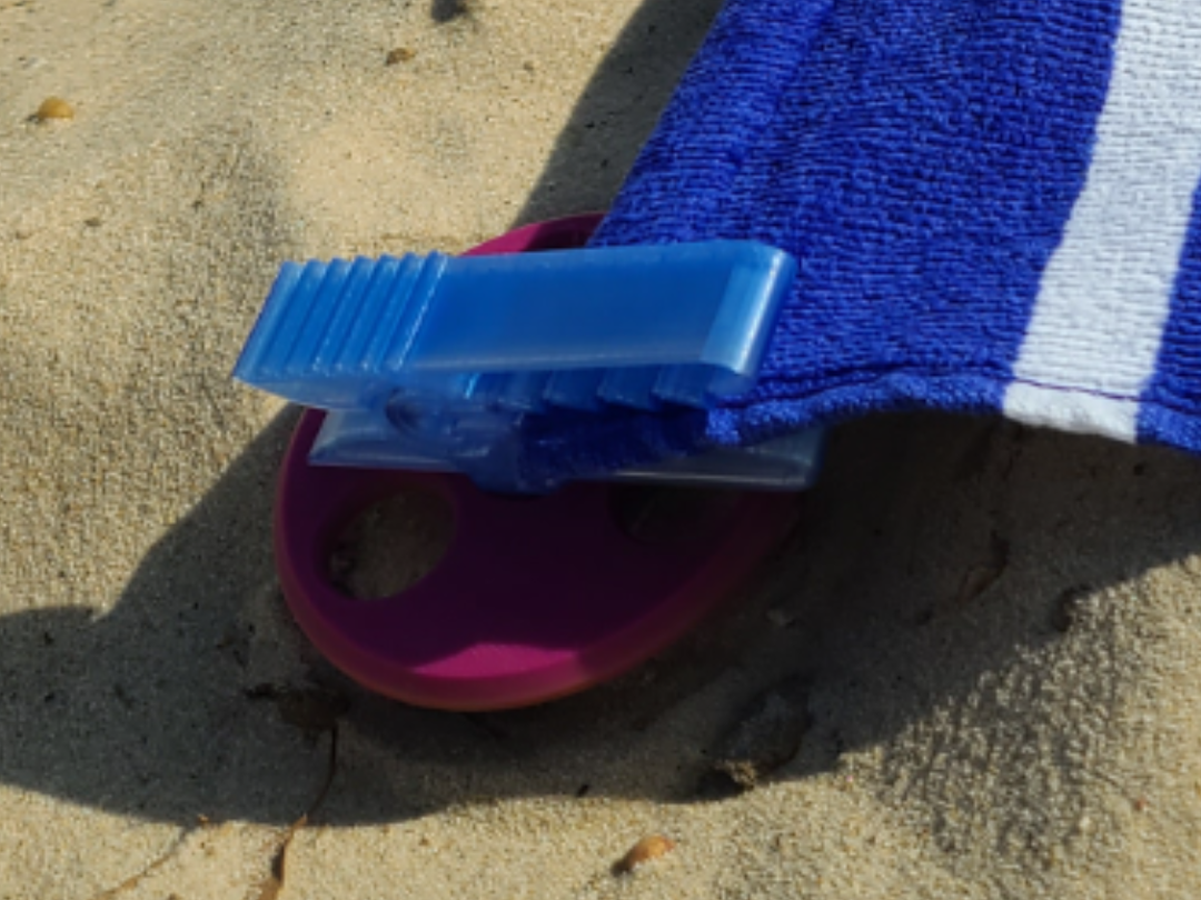 Beach towel sand clip