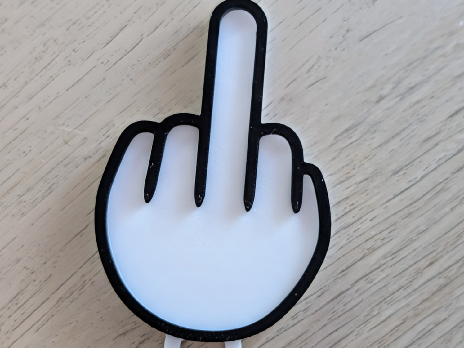 Middle flinger flip keychain