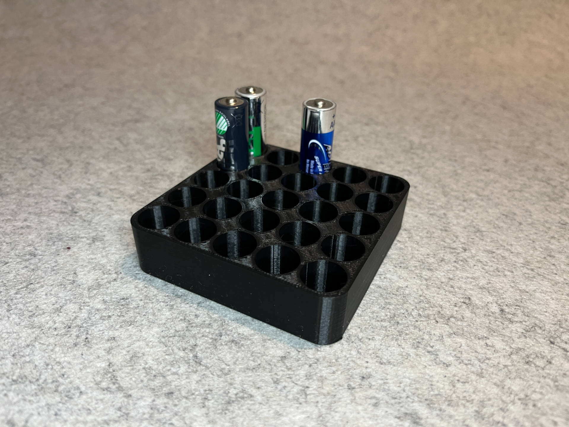 Battery holder for 25 AA batteries