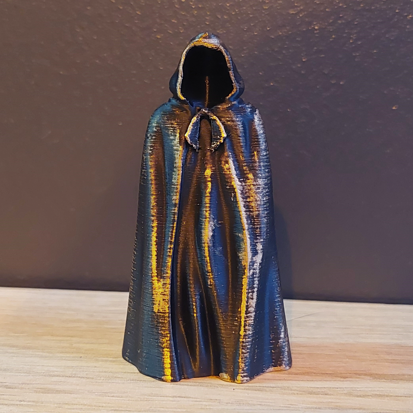 a ghost under a black cloak