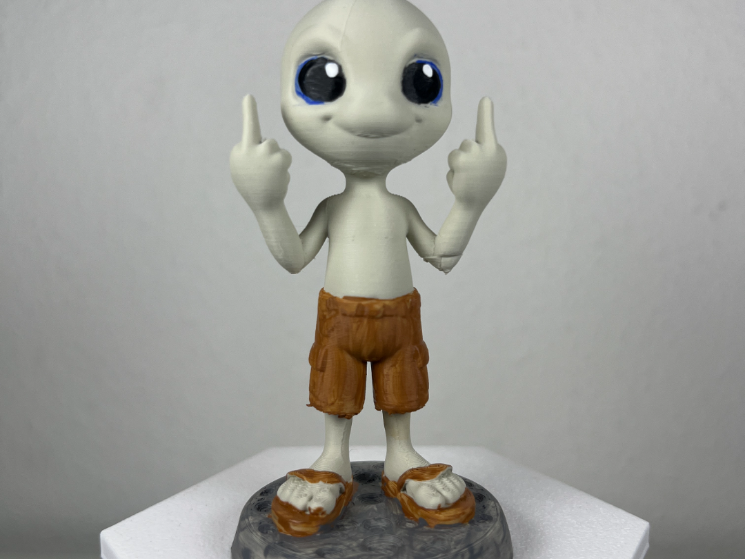 Paul The Alien flipping two birds