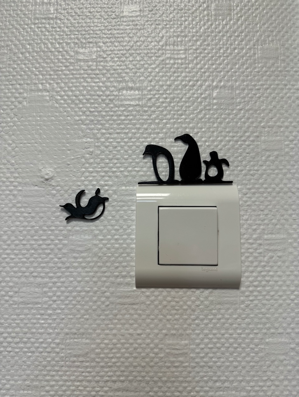 Penguin switchboard or outlet deco