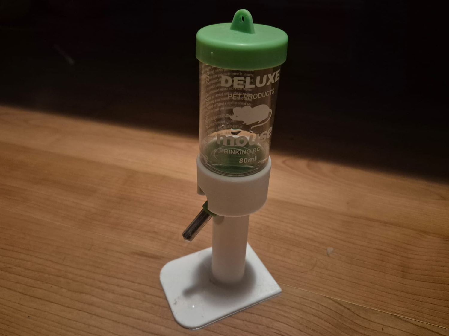 Standing hamster/gerbil water bottle support