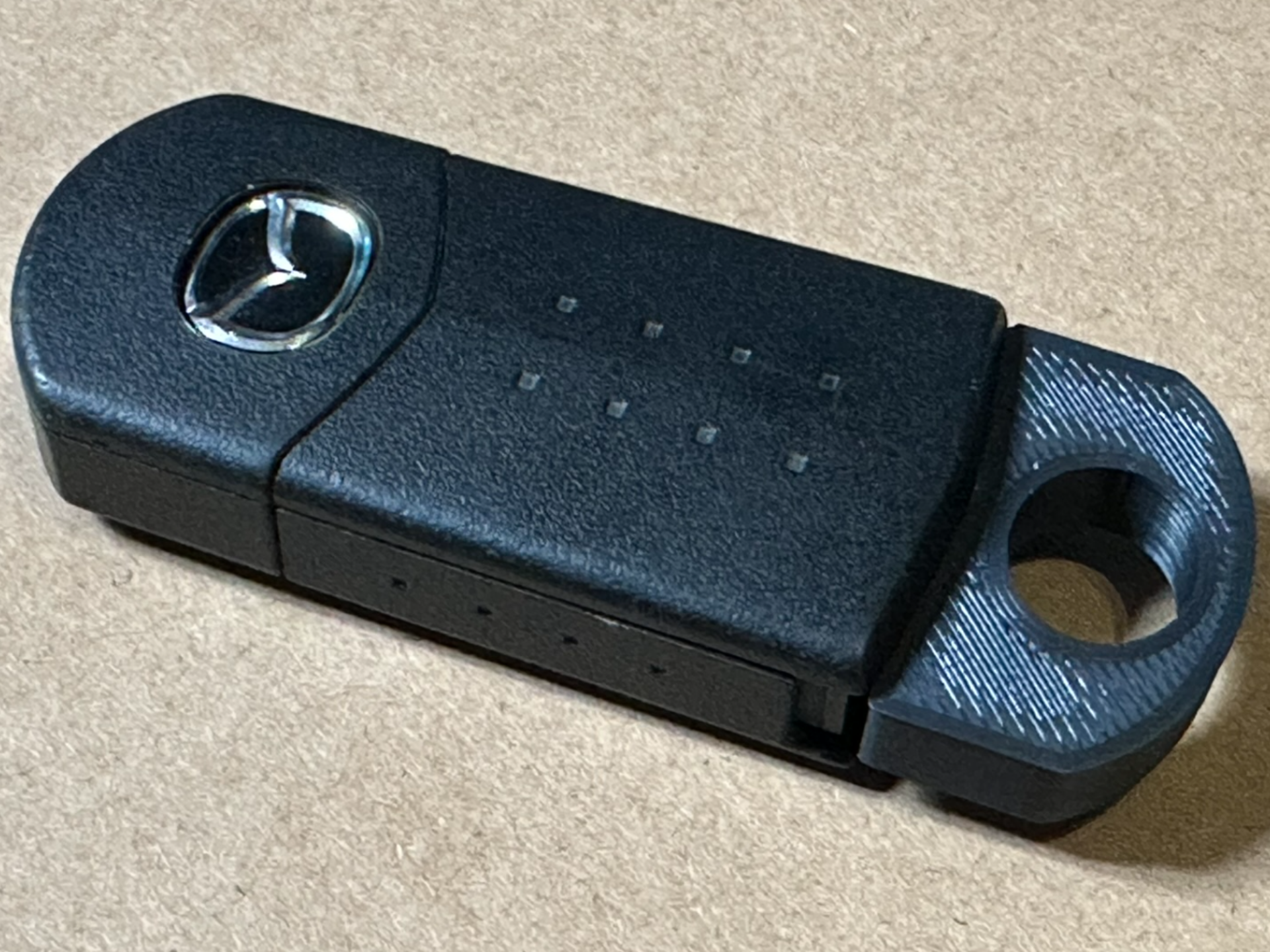 Mazda 4-button Flip Key Keyhole Replacement