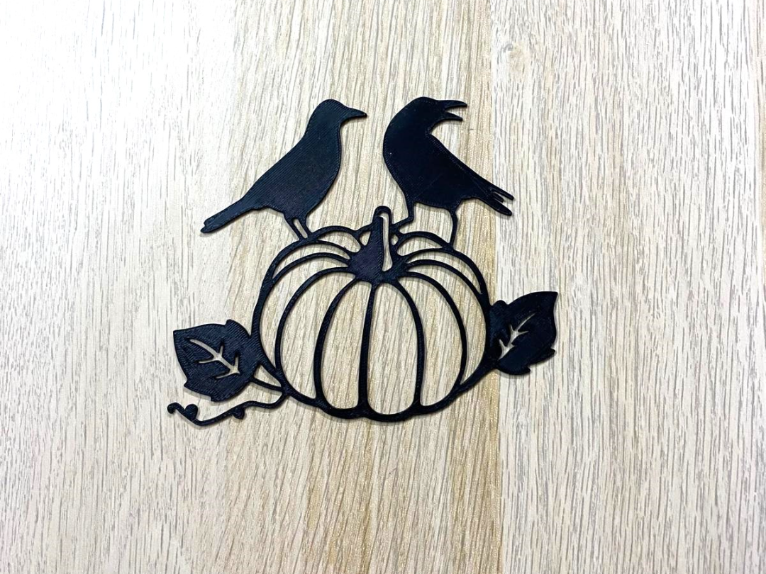 Crows resting on the pumpkin