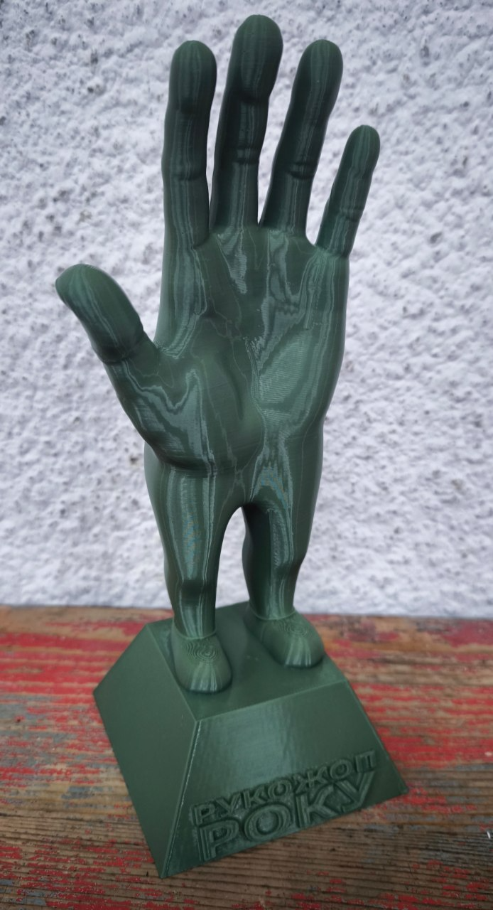 Hand-ass figurine